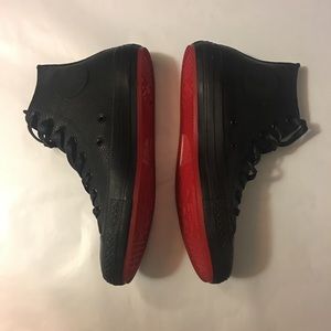 black converse with red bottoms